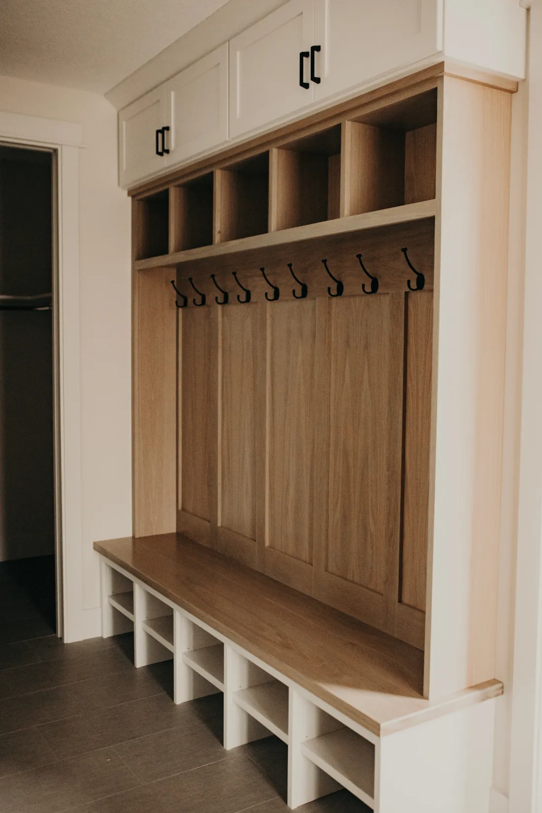 Custom white-oak mudroom built-ins by Keller Homes